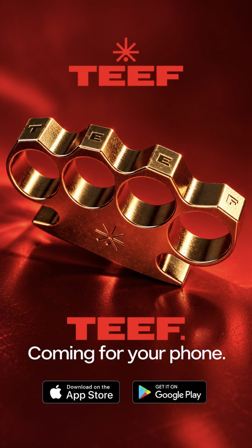 Gold TEEF knuckle-duster on a red background